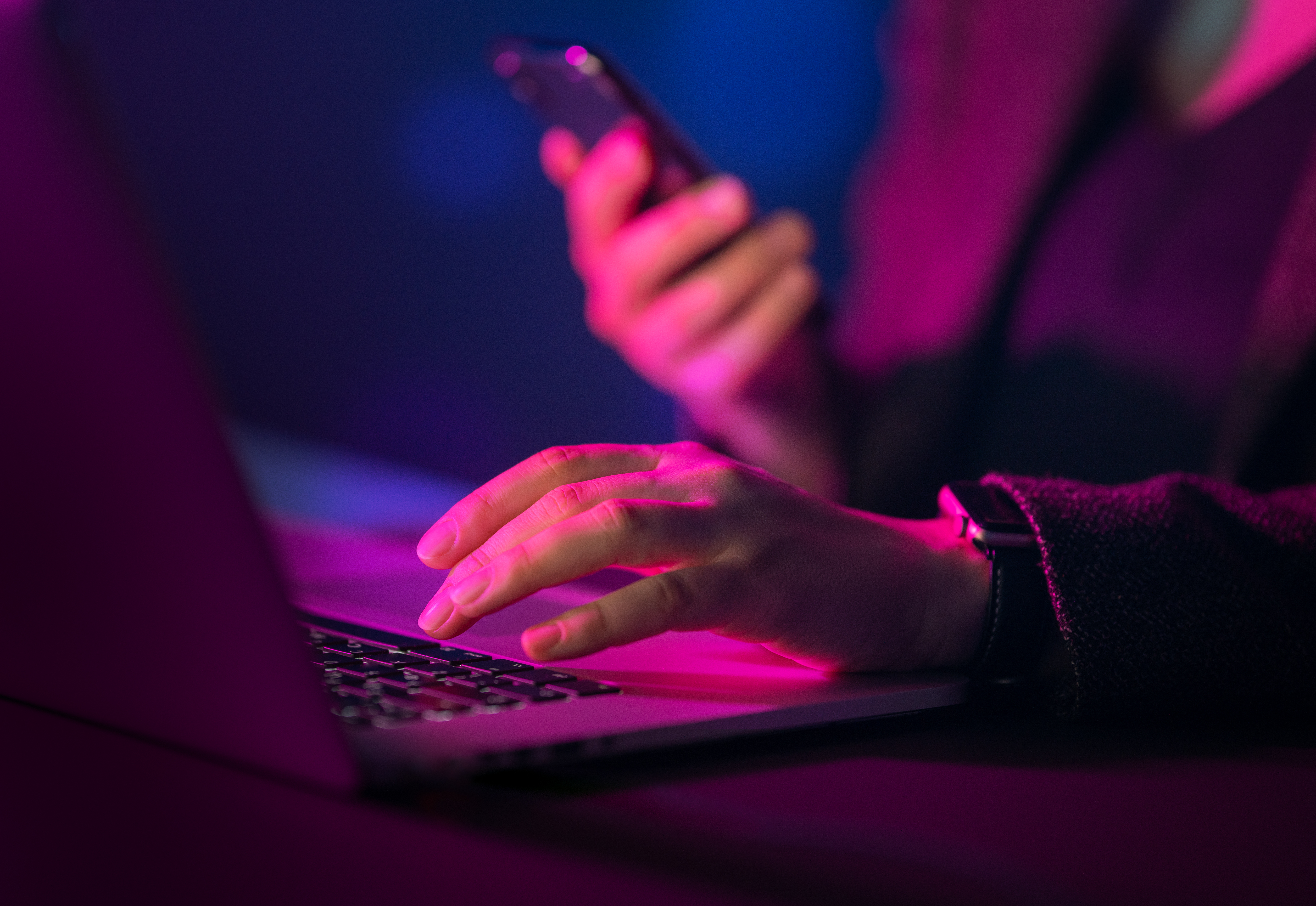 Computer and hands close up