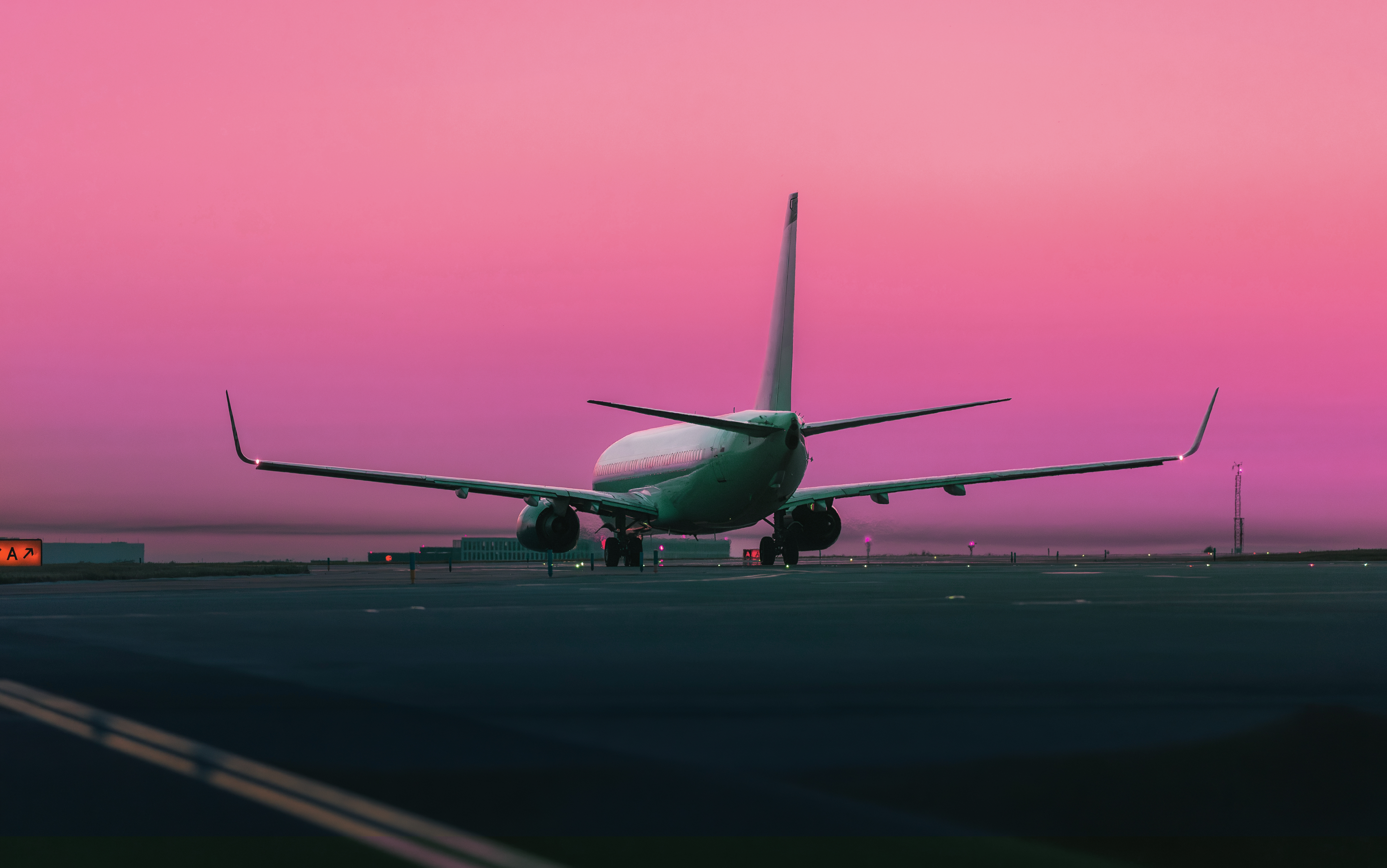 Traffic,At,Airport,At,Golden,Sunrise.,Wide,Shot,Of,Passenger